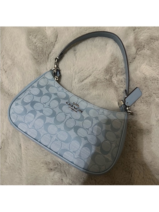 Coach Handbags - Coach light blue denim Teri purse
